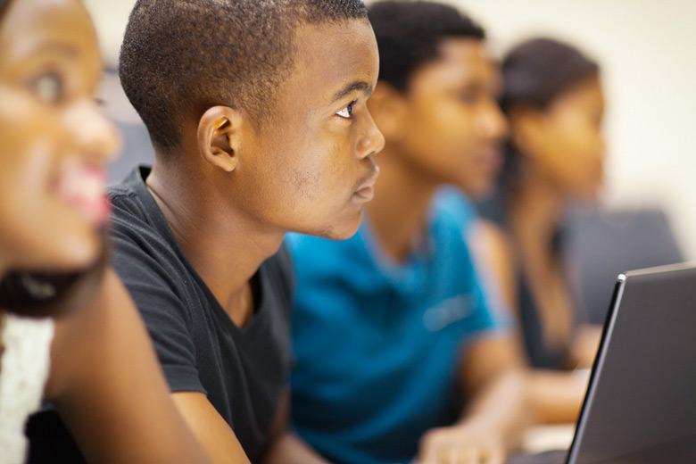African American students in classroom / michaeljung/Shutterstock