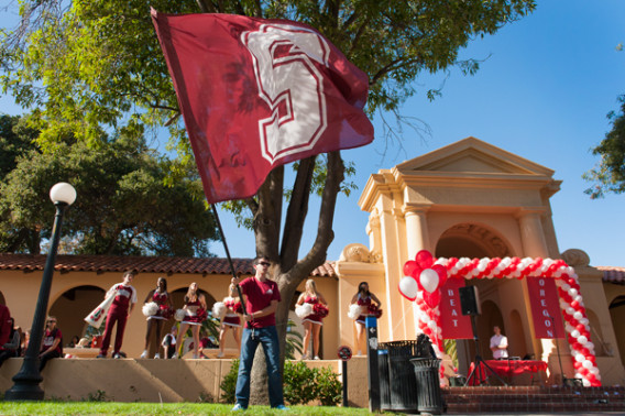 Members of the Stanford Axe committee and the Stanford Band perform during the noon rally.