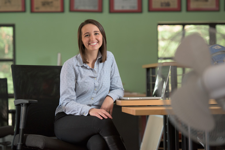 Photo of Erica Evans at a desk.