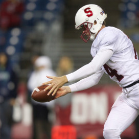 Ben Rhyne (above) excelled both on the field and in the classroom during his career on the Farm. He graduated with a 3.88 GPA and has high hopes that he will get drafted into the NFL this weekend. (STEPHEN BRASHEAR/stanfordphoto.com)