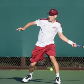 Michael Genender (above) returned to the starting lineup against UCLA after suffering a dramatic three-set loss against Cal last week. The freshman bounced back for a 6-1, 6-4 victory on Court 6, but Stanford still fell, 4-3.(RAHIM ULLAH/The Stanford Daily)