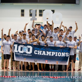 Stanford men's swimming and diving poses for a photo after winning its first conference title since 2012 and the 63rd in program history. The Cardinal have not won a national title since 1998. (CHUCK ARELEI)