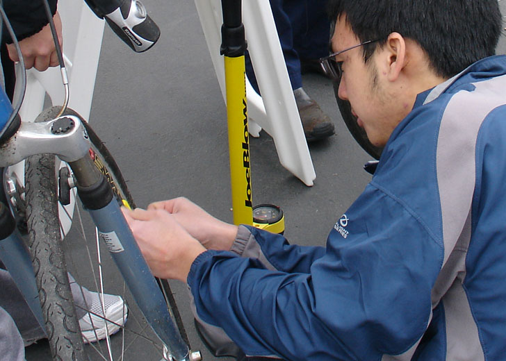 bike expert performing a tune up