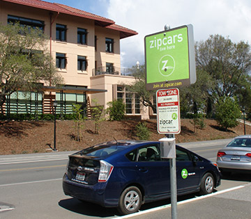 zipcar parked across from Knight Management Center
