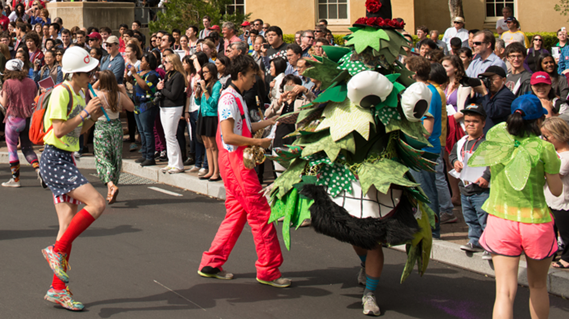 Students celebrating with the mascot