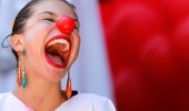 A reveller performs during a clown parade in Rio de Janeiro | Reuters/Sergio Moraes
