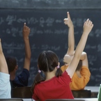 Students raising their hands