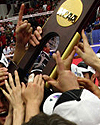 Stanford Athletes holding NCAA championship plaque