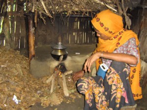 Research in southern Bangladesh: for 90 minutes, twice a day, smoke from this cookstove (woman shown wearing a particle monitor) is at concentrations that are almost 20 times as high as the U.S. 24-hr fine particle standard.