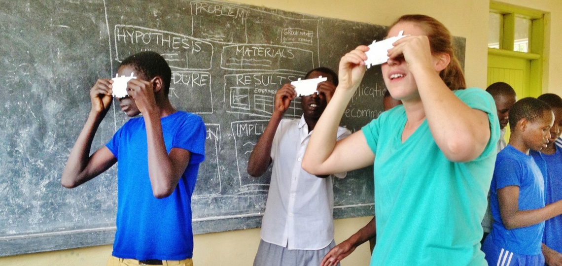 Students trying the low-cost microscope