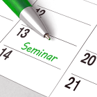 Weekly calendar or planner with word "seminar" written in green pen