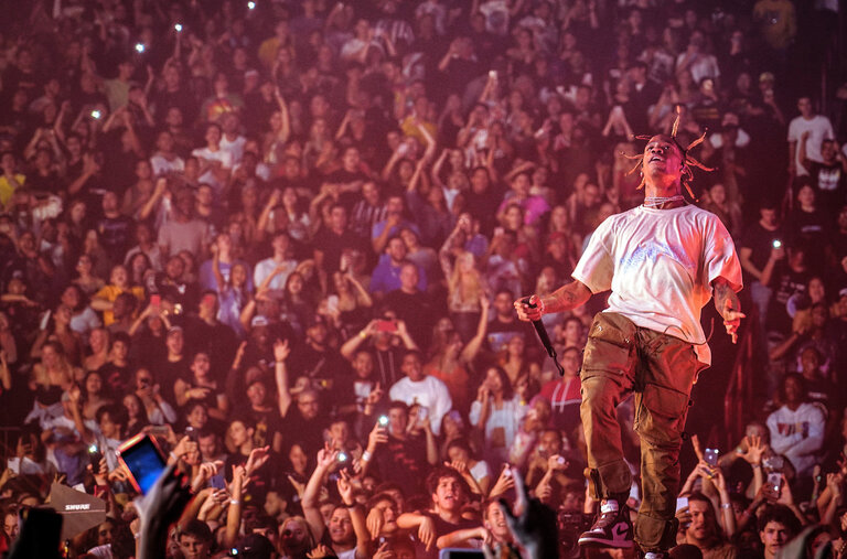 Travis Scott onstage in Miami in 2018 supporting “Astroworld,” the album that cemented him as a hip-hop superstar and master of marketing.
