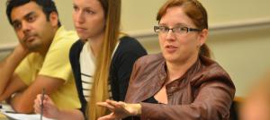 A woman explains her perspective. Photo by Rod Searcey for Stanford CTL.