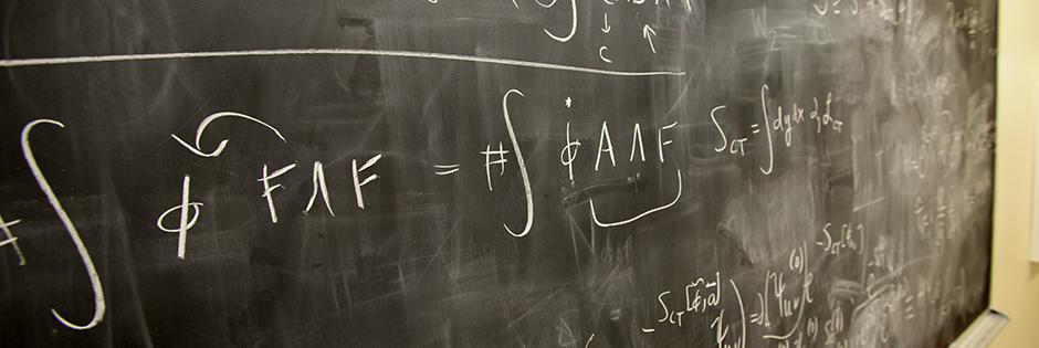 Chalk board with equations. Photo by Brad Plummer.