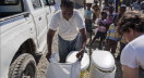 Residents of Cap Haitien, Haiti receive portable, affordable dry household toilets