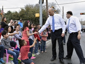 Secretary Jeh Johnson greets children during parade