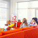 Students sitting in a lounge area.