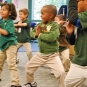 Kindergarteners practice hip-hop dance
