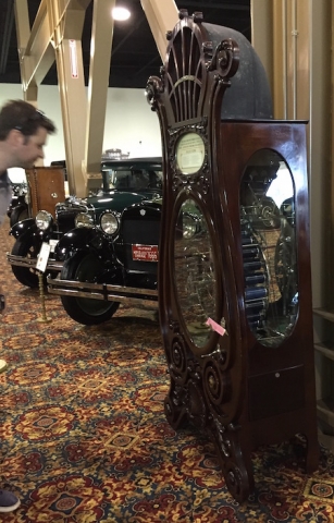 Jon Manton examines a cylinder jukebox