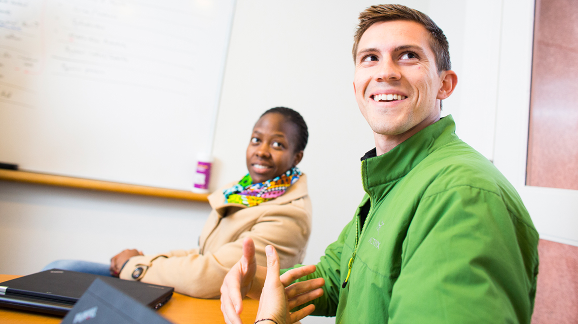 PhD students collaborating in a study room