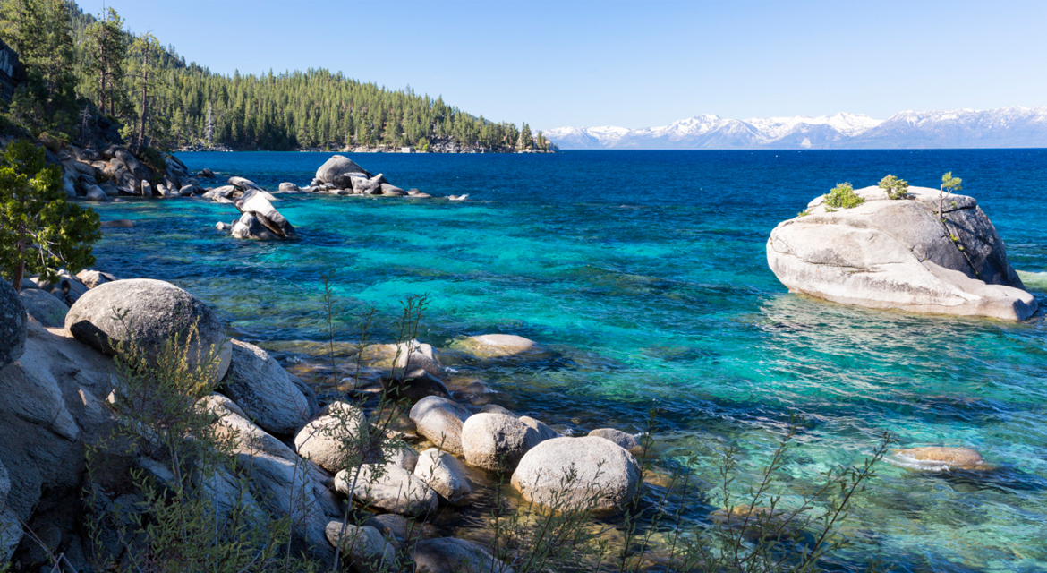 Sparkling Lake Tahoe lapping a rocky beach