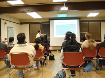 An audience watching a lecture at Bechtel International Center