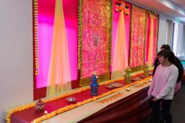 Attendees looking at the display at ASF's Diwali-Festival of Lights celebration 2014