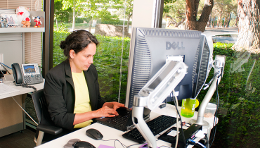 Female working at desktop computer