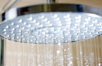Large shower head streaming water