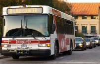 Marguerite Shuttle driving along Palm Drive.