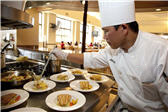 Chef serving at arrillaga family dining commons
