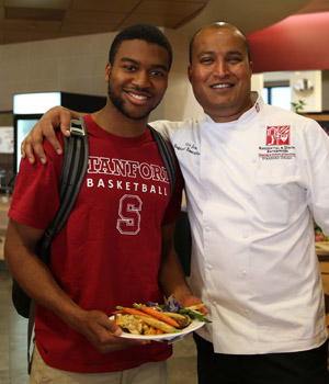 Chef Nijo and a Stanford students inside the Arrillaga Family Dining Commons