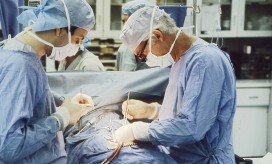 photo of surgeons performing a surgery