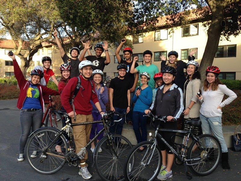 Students wearing bicycle helmets