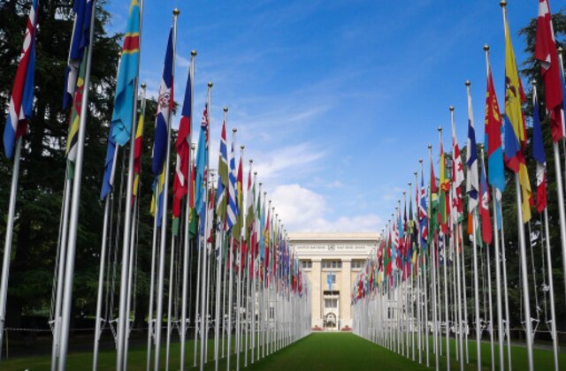 The Flag draped entrance to the United Nations Building in Geneva Switzerland.