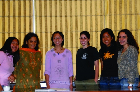 Five undergraduate women pose for a photo with the SCID India Program Director