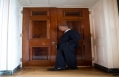 President Obama Listens Through A Door