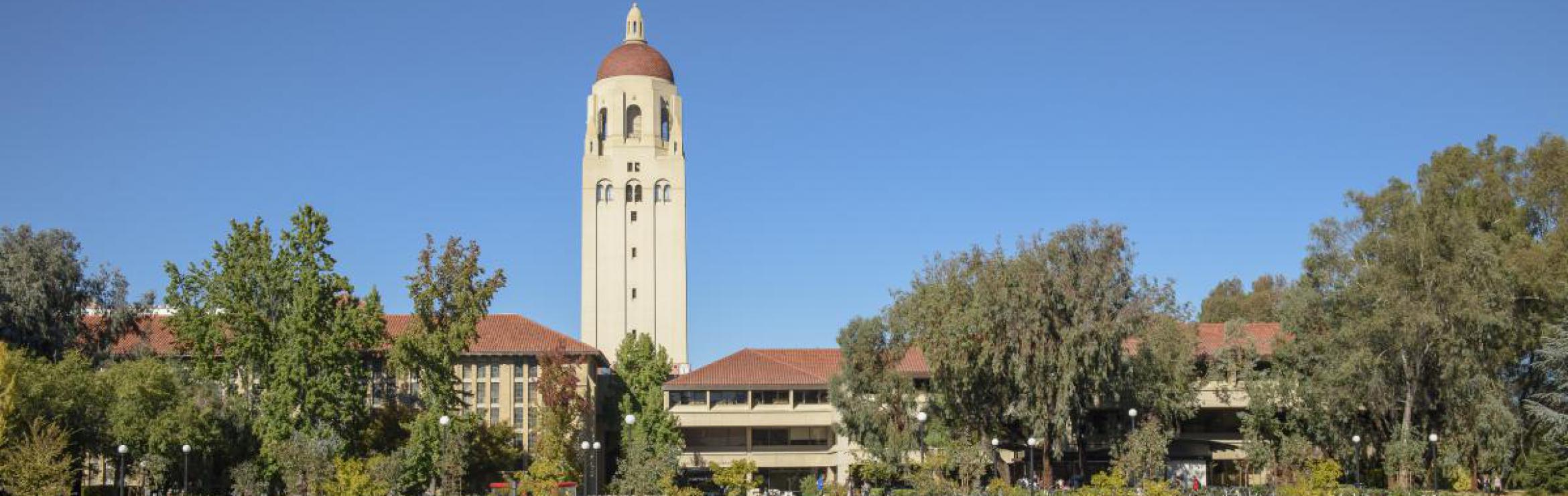 Outdoor view of Stanford Green Library with Meyer Green in the foreground