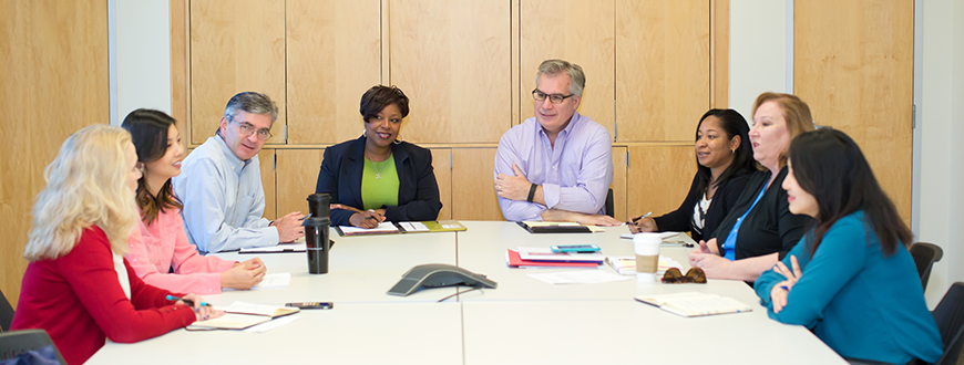 Colleagues talking in a meeting