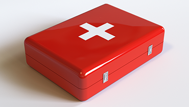 Red emergency first aid kit with white cross on top.