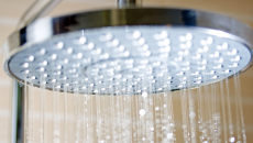 Large shower head streaming water