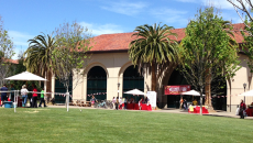 Wellness Fair activities outside Arrillaga Center for Sports & Recreation, including a horse petting station