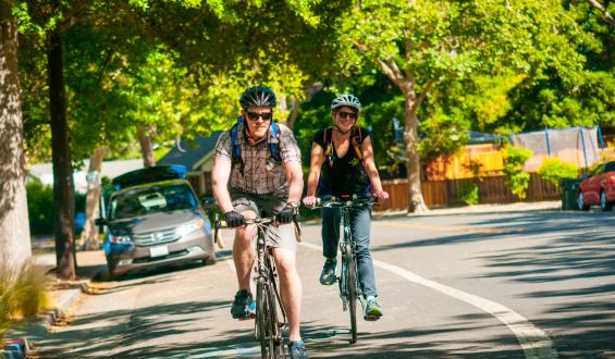 man and woman on bikes