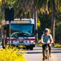 Marguerite bus and cyclist on Palm Drive