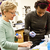 Stanford professor Martha Cyert and students.