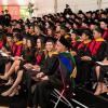 students sitting at a commencement ceremony