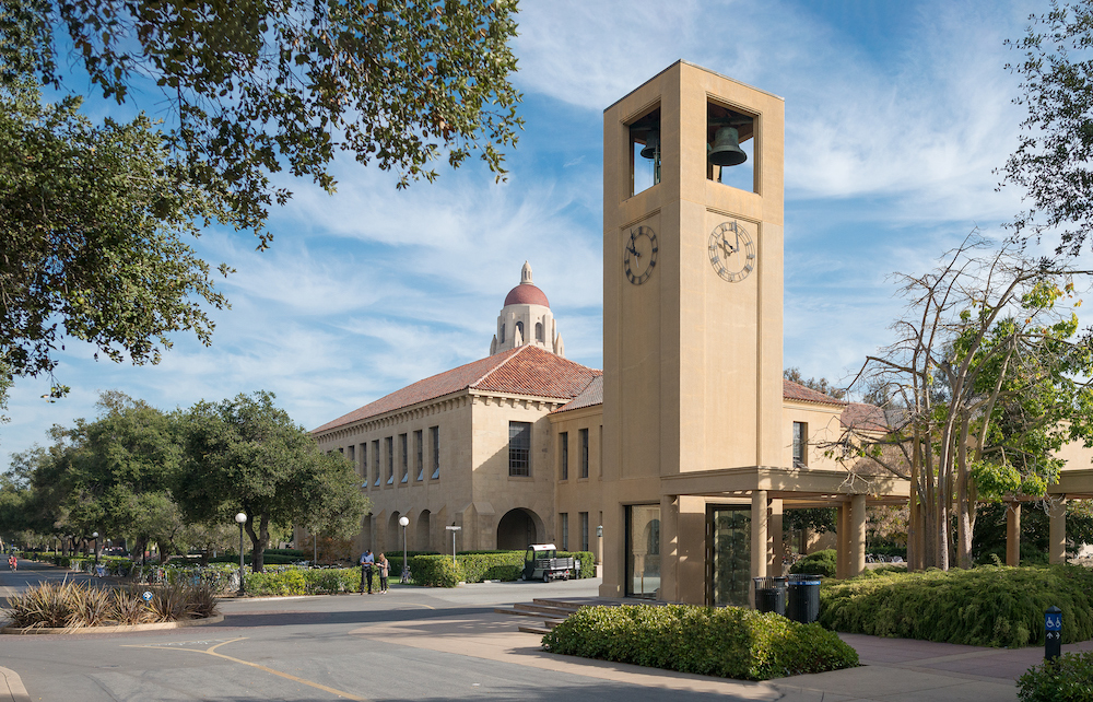 Photo of Barnum clock tower next to Education Building.