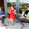 Three Stanford grad students engaged in a discussion