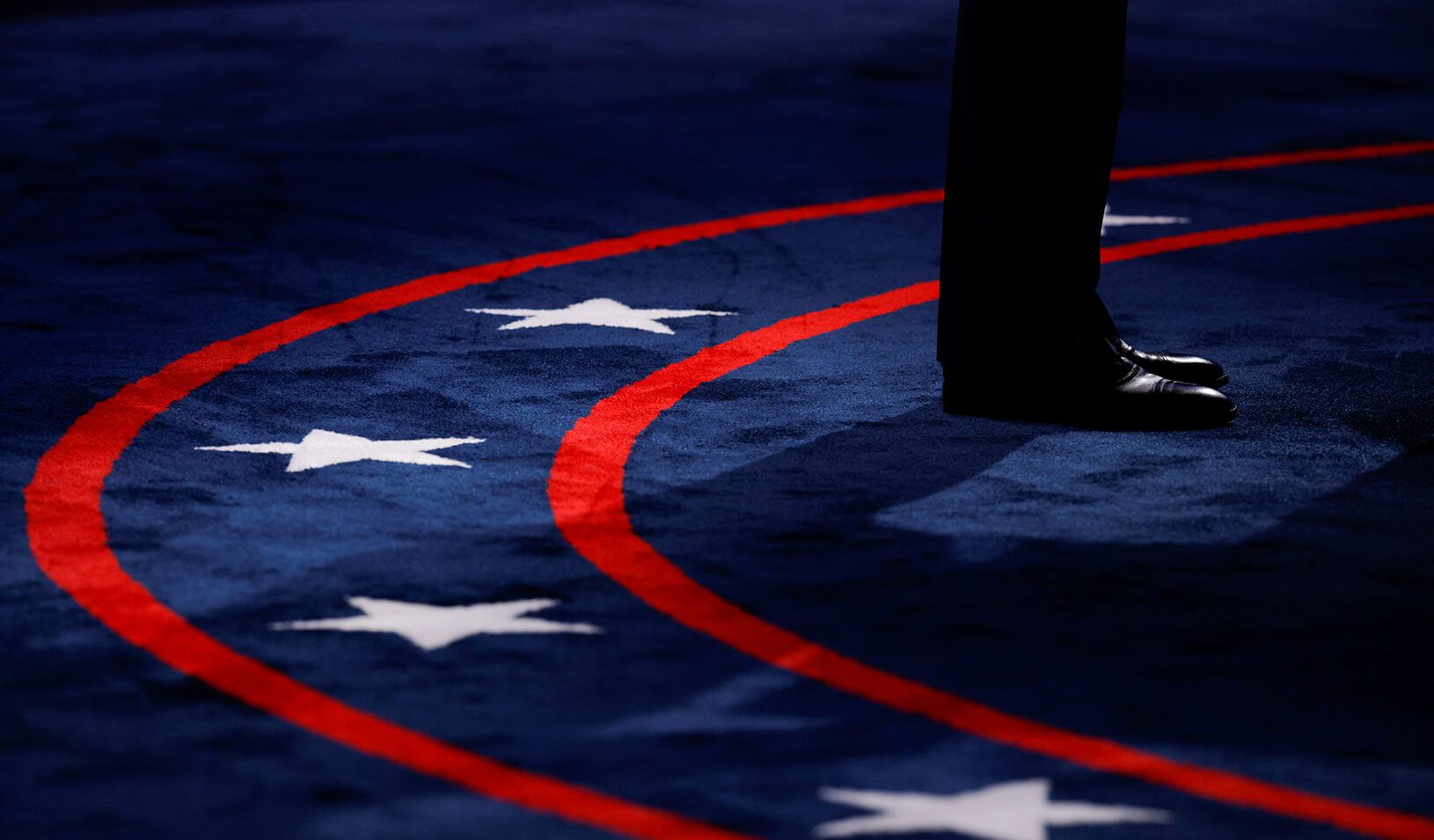 U.S. President Donald Trump stands at his podium as he participates in the first 2020 presidential campaign debate with Democratic presidential nominee Joe Biden. Credit: REUTERS/Brian Snyder