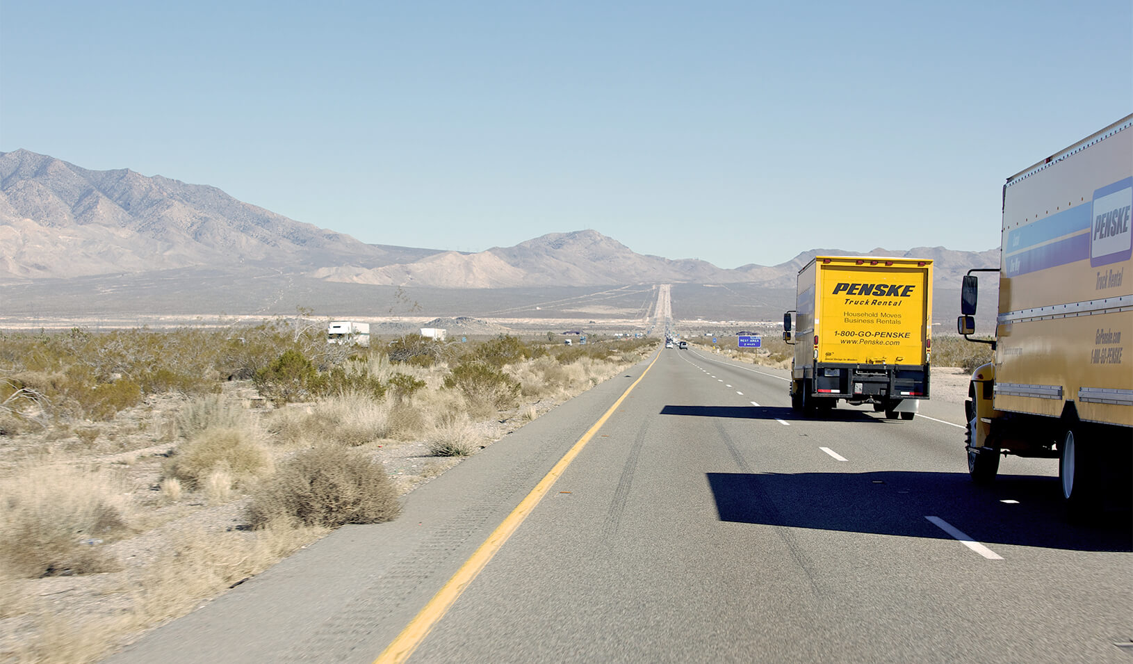Moving vans headed east out of California. Credit: iStock/eyecrave